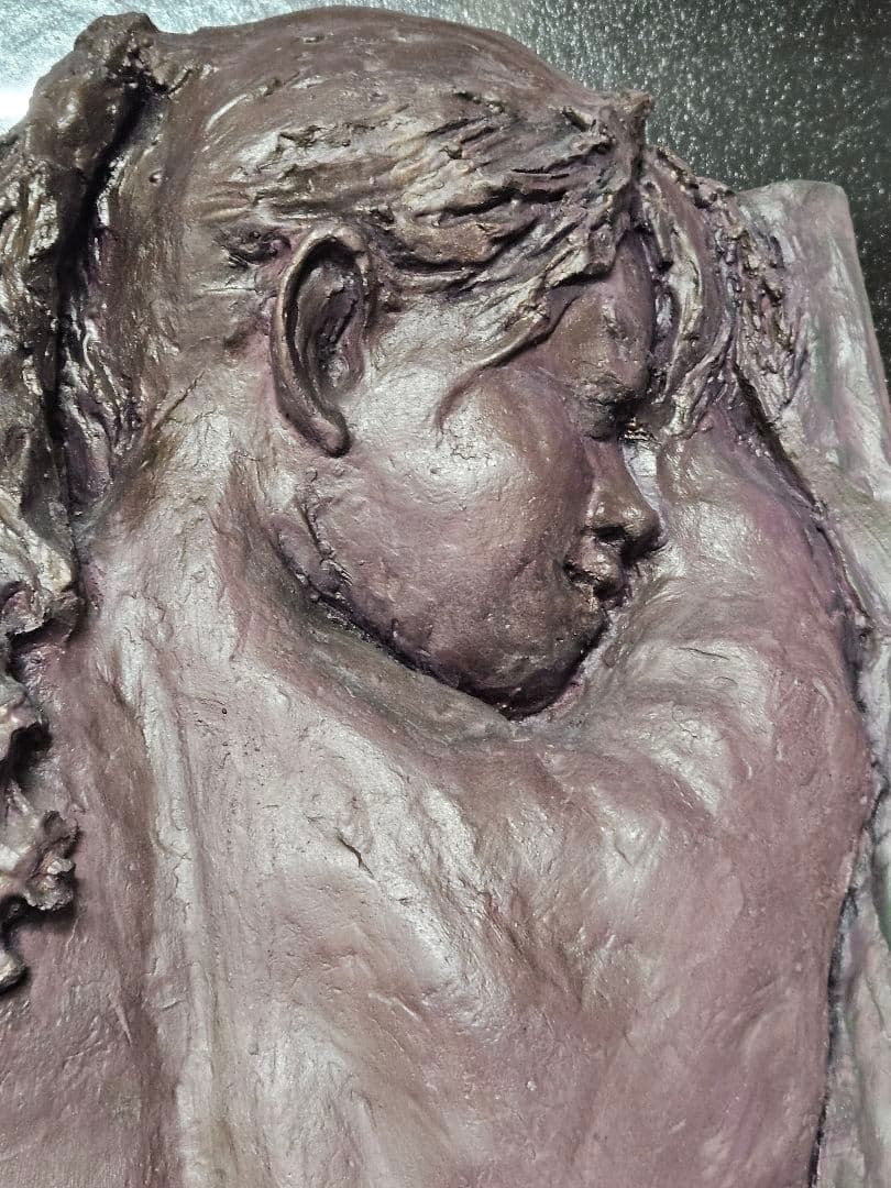 彫刻レリーフ 背中