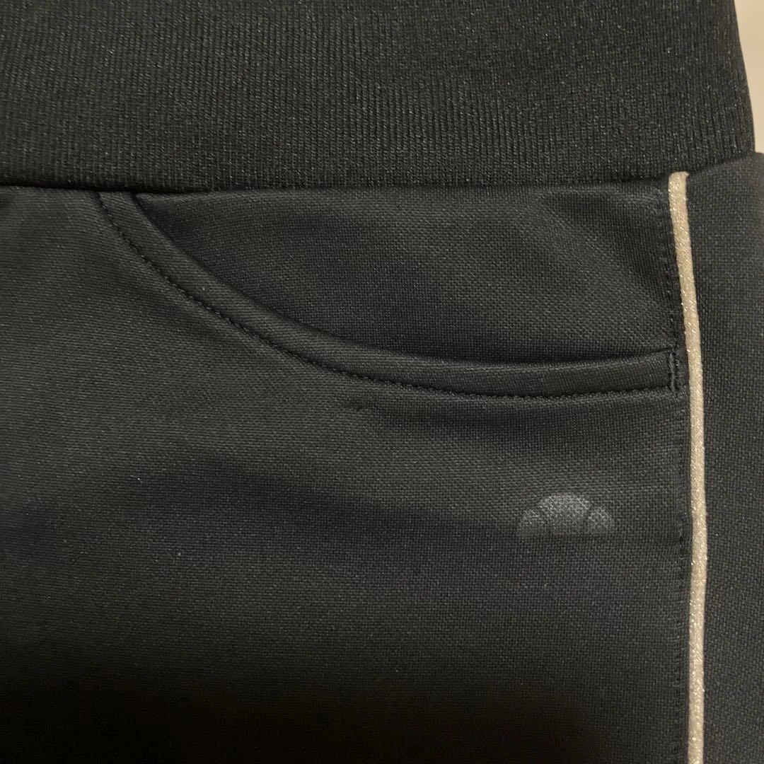 ELLESSE ジャージセットアップ ブラック パンツバックロゴ刺繍レディースＭ