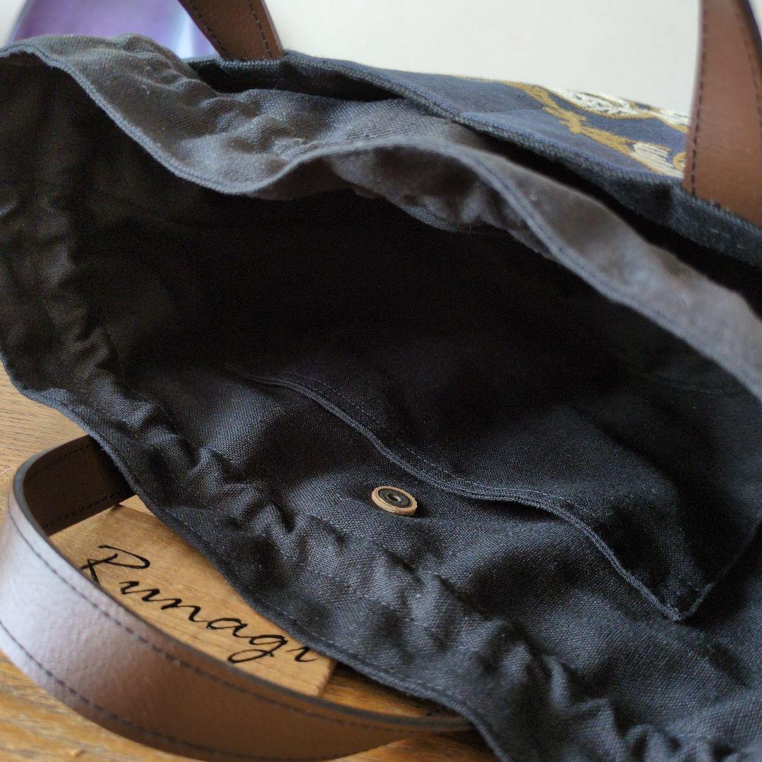 あおりポケットの巾着バッグ＊ミナペルホネン following day