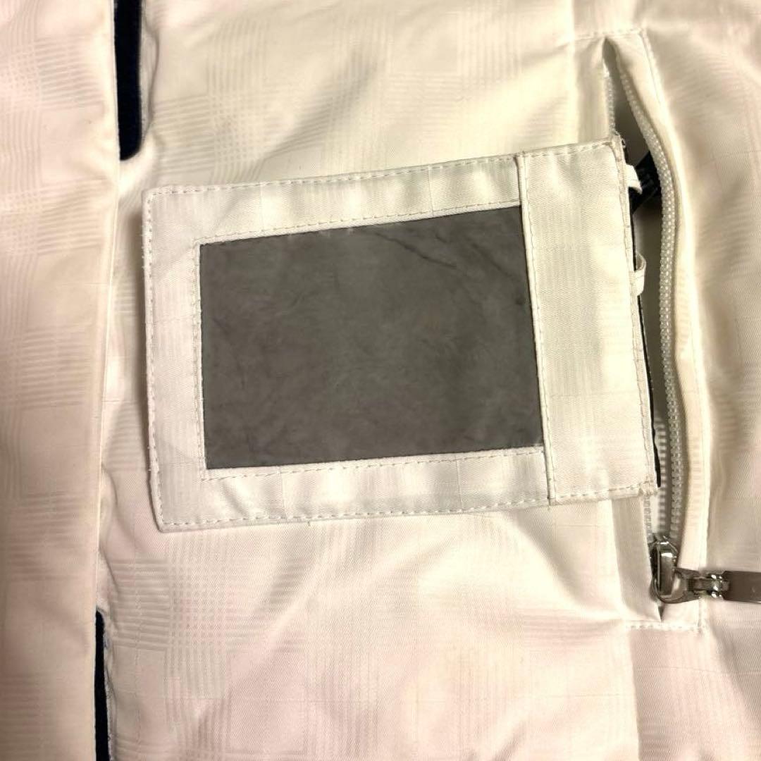 スキーウェアセット　ベージュファー付きホワイトジャケットとブラウンパンツ