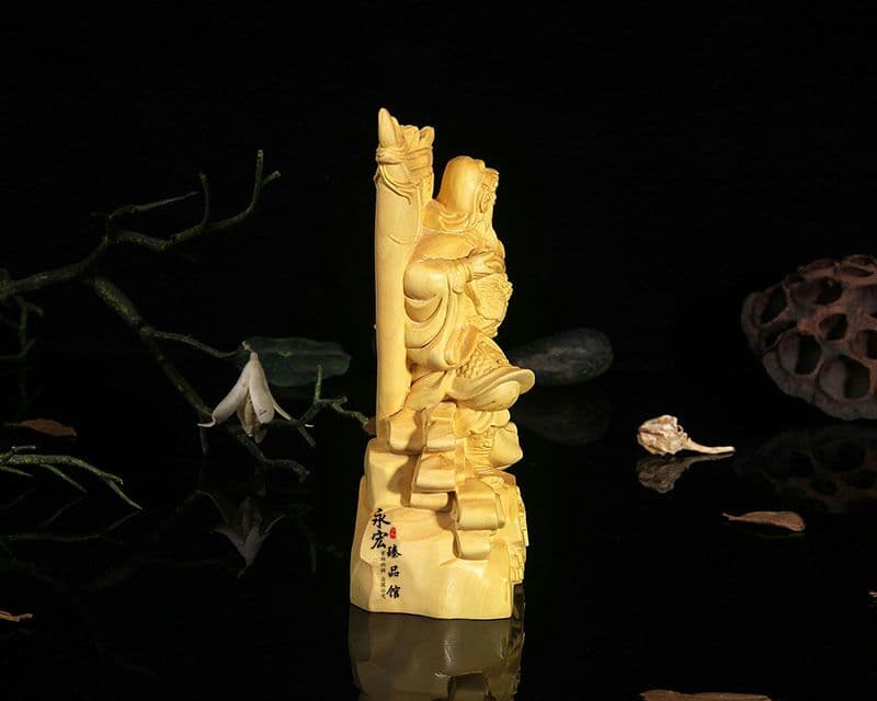 黄楊の木の旗は振り子の黄楊の木の彫刻に勝っています 関二爺関公の家には木の彫