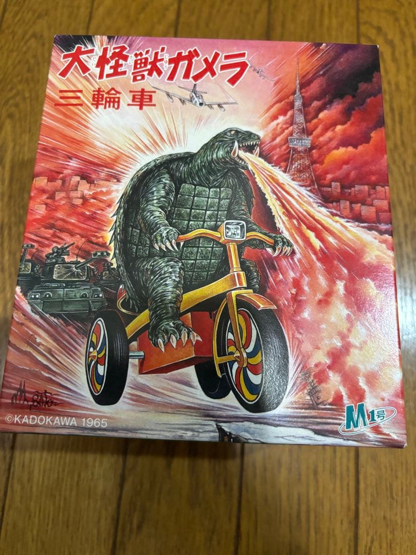 新品　M1号　ガメラ生誕60周年【ガメラ三輪車】ゴールド　ペンダント付　金色塗装