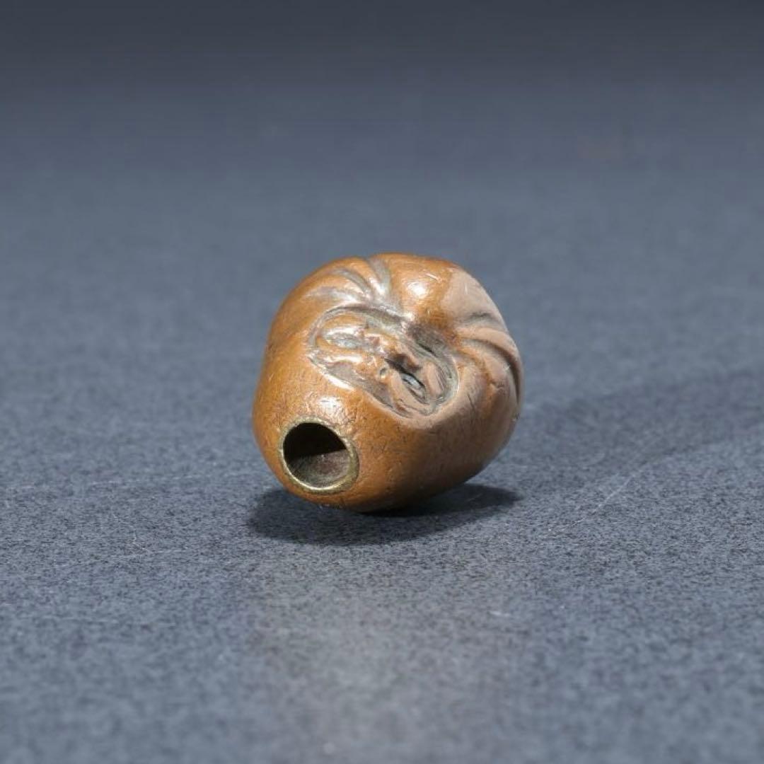 緒締め玉　達磨　提げもの　金属　茶色　金工　R1641