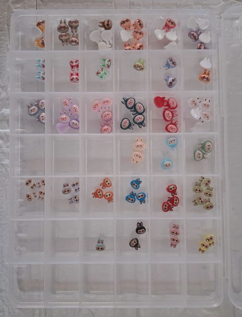 ネイルパーツ大量 ケース入り9箱セット 多様なデザイン