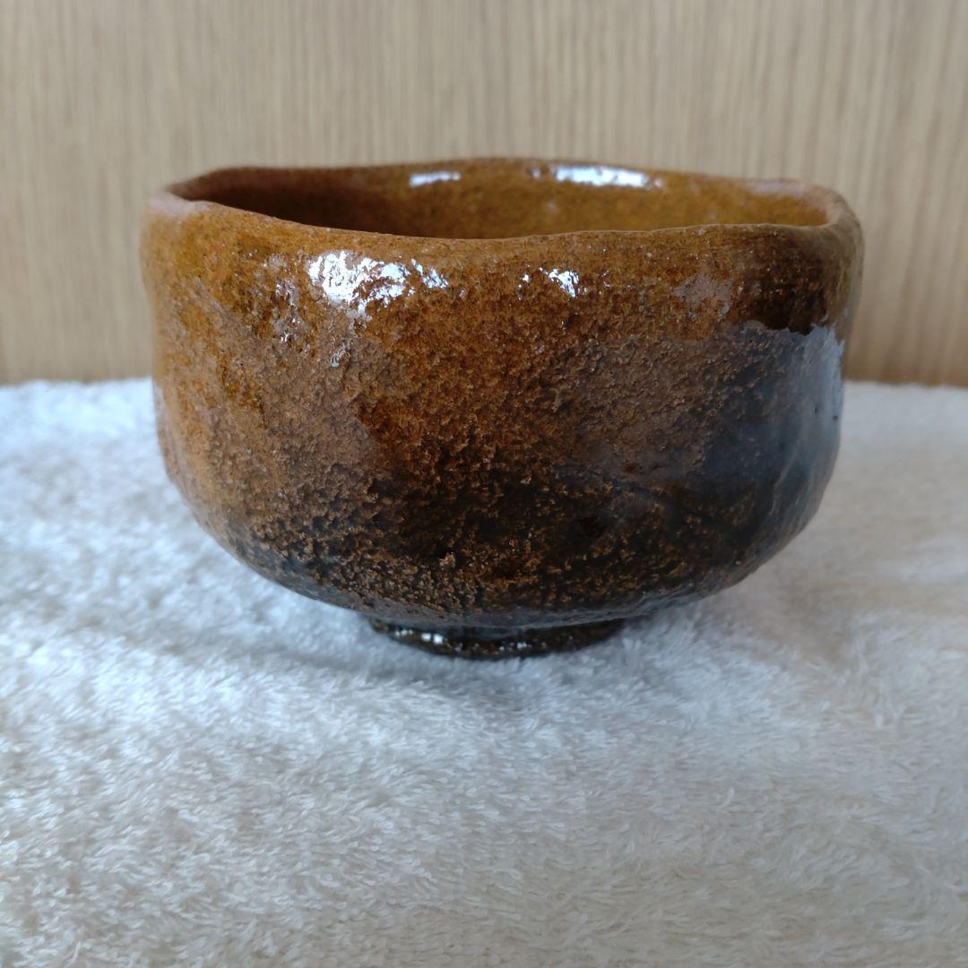 大樋焼　抹茶茶碗　飴釉　春日山　開発文明　共箱