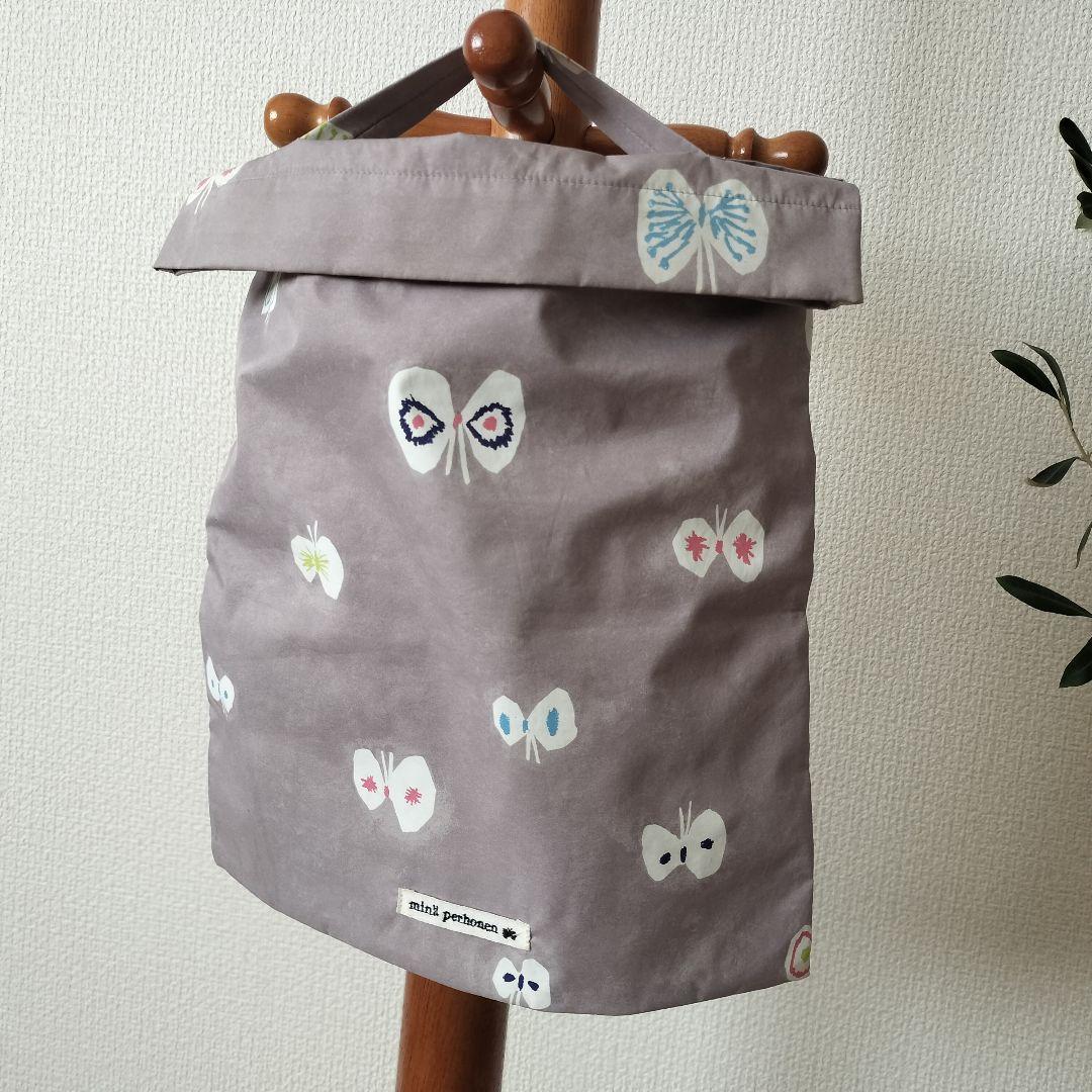 【ミナペルホネン】chouchoのレディースレインコート