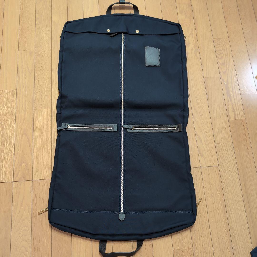 MISMO ミスモ ナイロンガーメントバッグ