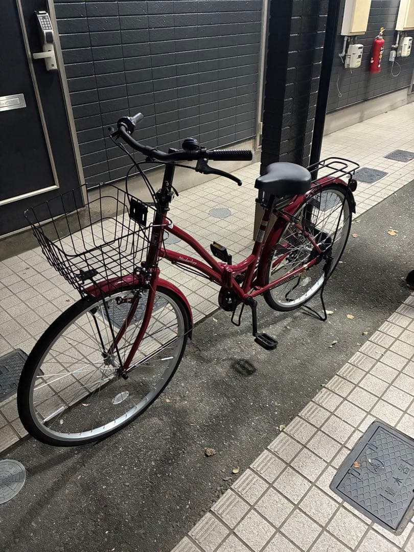赤い折りたたみ自転車 前面バスケット付き