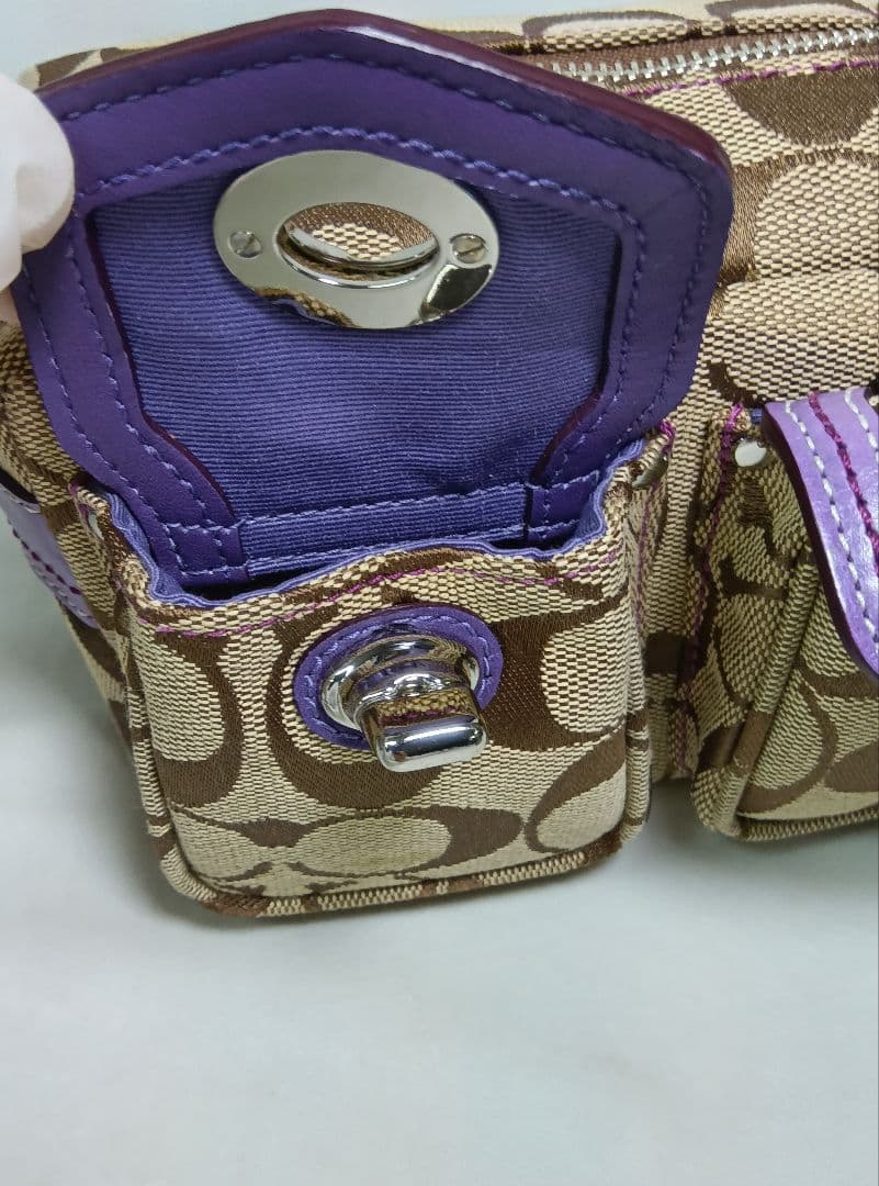 COACH(コーチ) ポーチ　ハンドバッグ　シグネチャー柄　ダブルターンロック