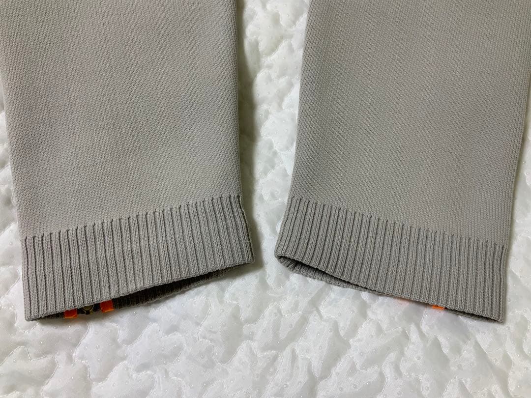 マークアンドロナレディースパンツ オレンジジッパー