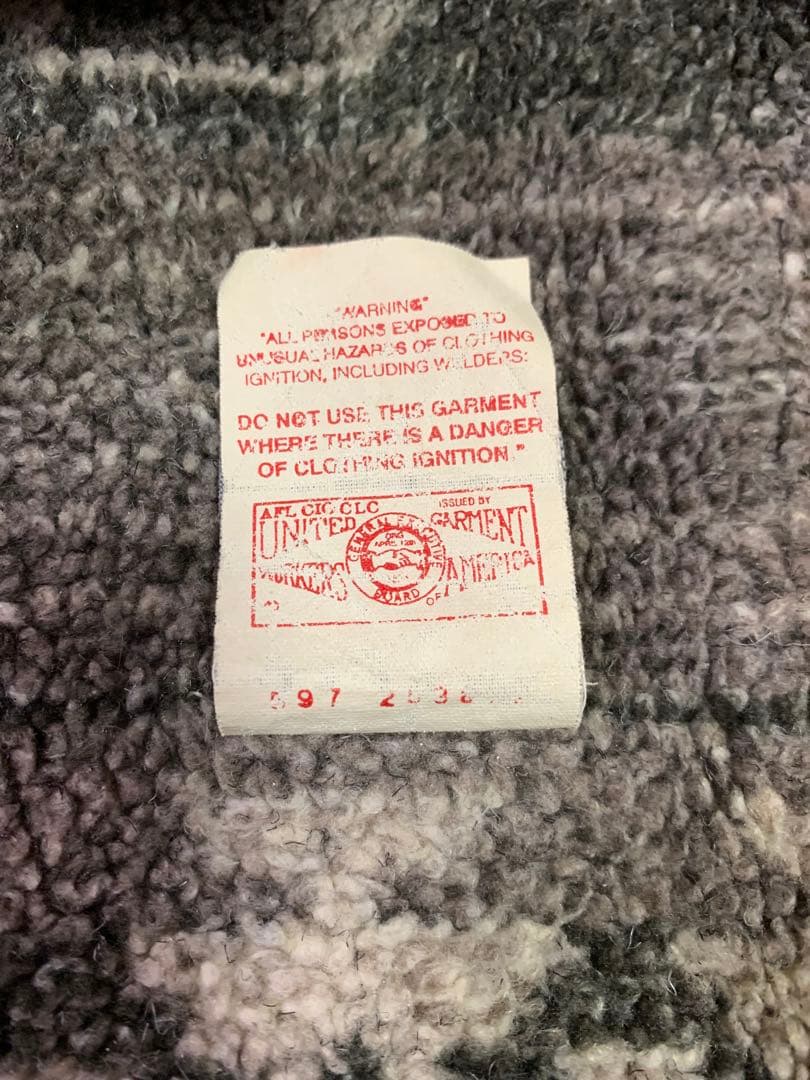 USA Carharttダック地ベスト 裏地ネイティブ柄 ボア ライナーXL