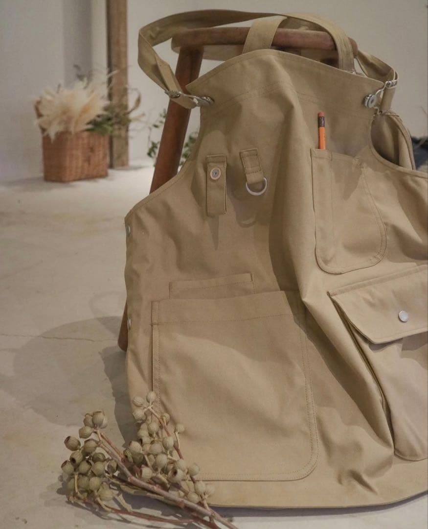 新品未使用 garage green works ベスト【ノベルティ巾着付き】