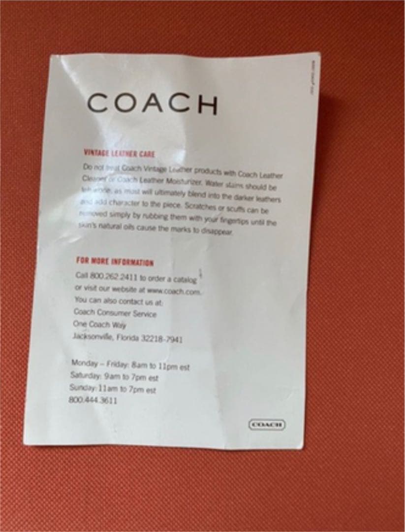 コーチ　オレンジ　エルゴレザープリーテッドフレームドサッチェル