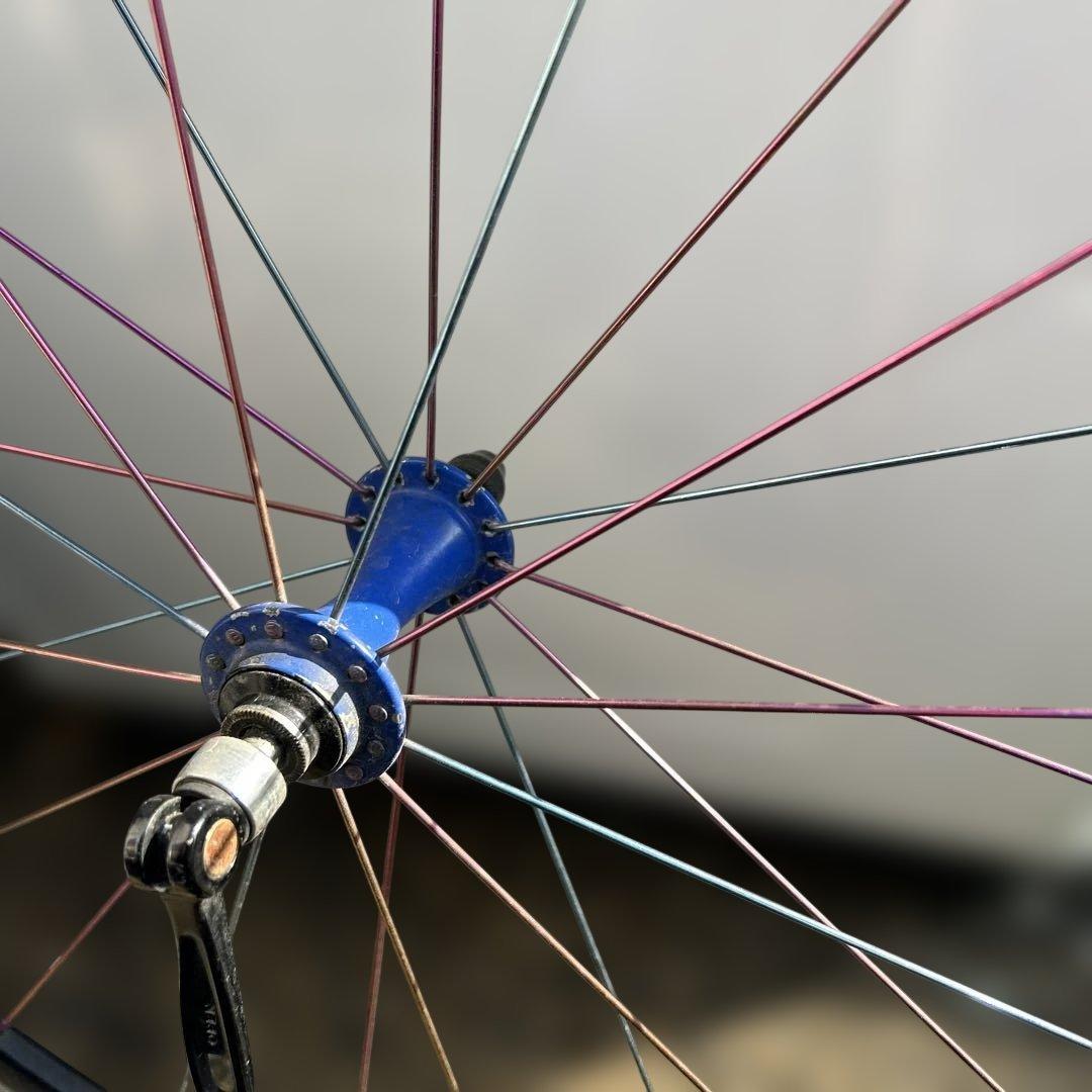 手組みホイールレインボースポーク前輪撤去品